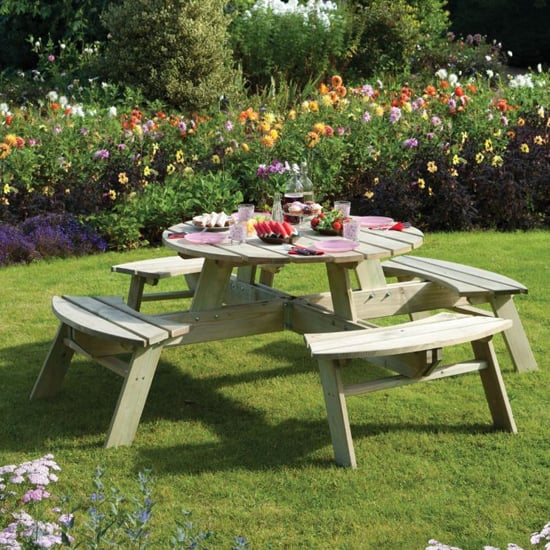 Photo of Zox round wooden 8 seater picnic dining set in natural timber